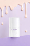 CureX brightening cream jar on a purple background with decorative elements