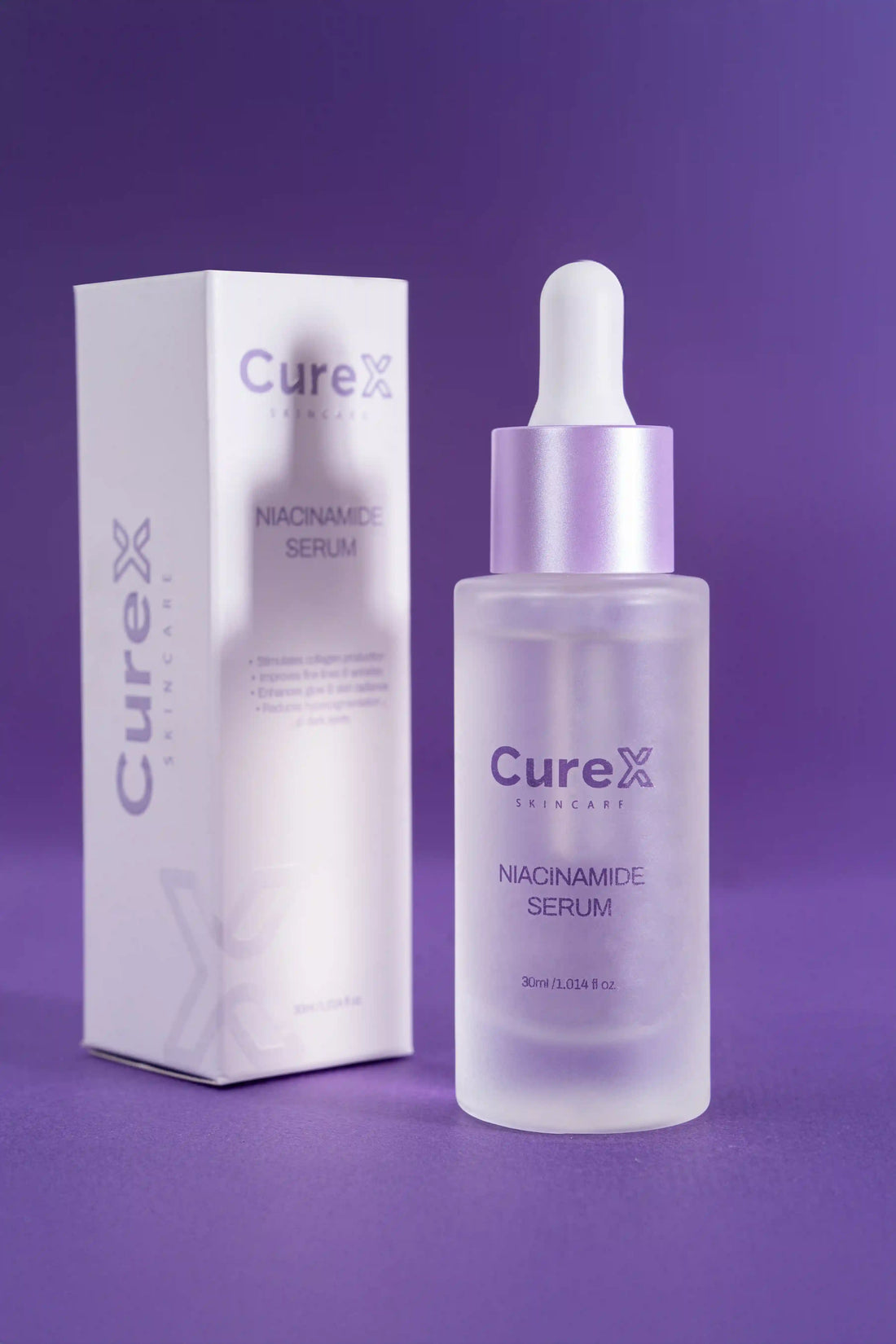 CureX niacinamide serum bottle and packaging on a purple background