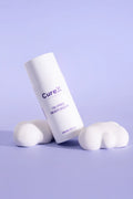 CureX skincare product on a purple background