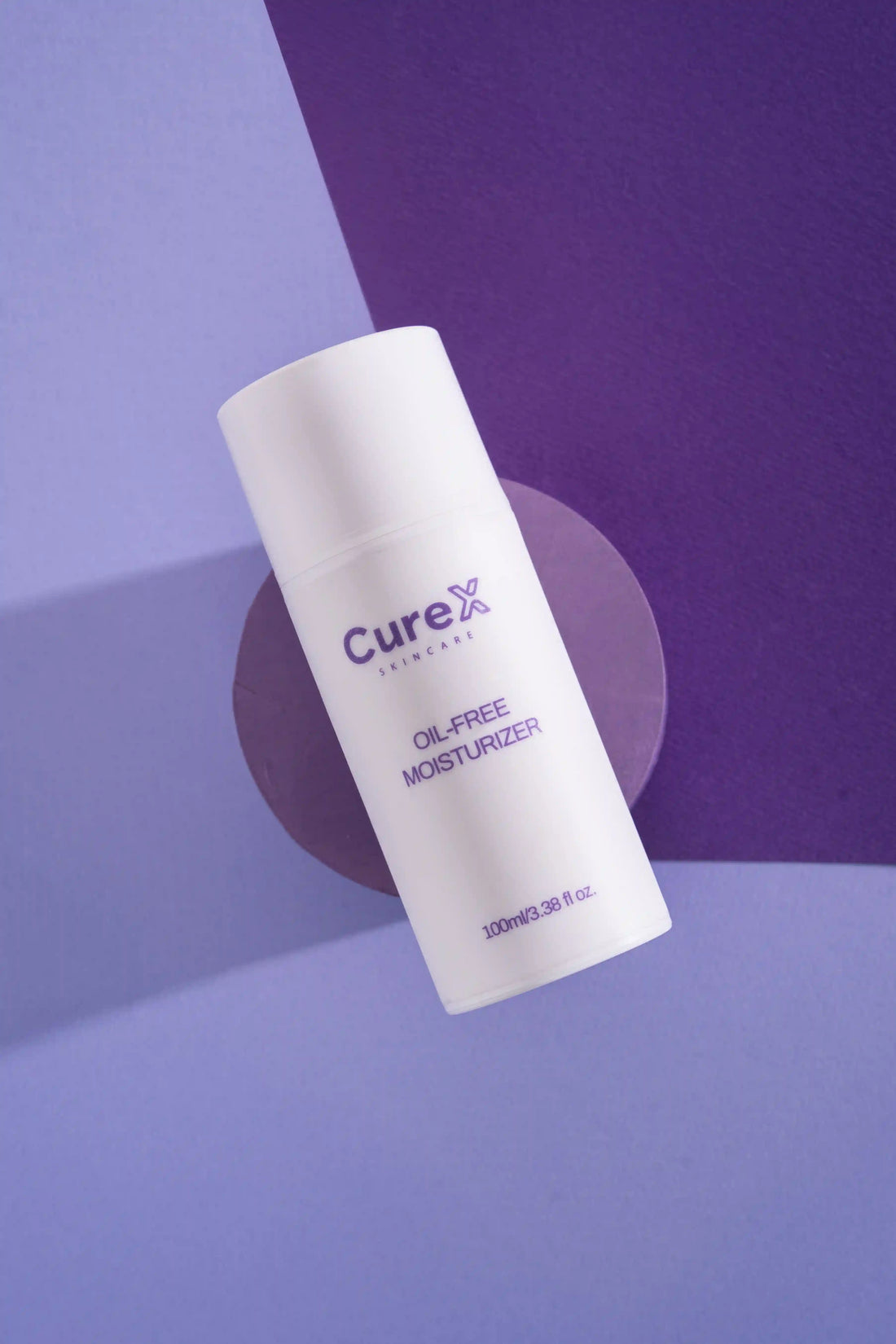 CureX skincare product on a purple background